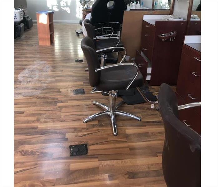 Damage wooded floors in hair salon